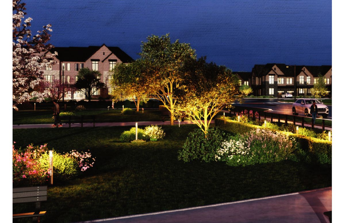 Landscaped community park lit at night