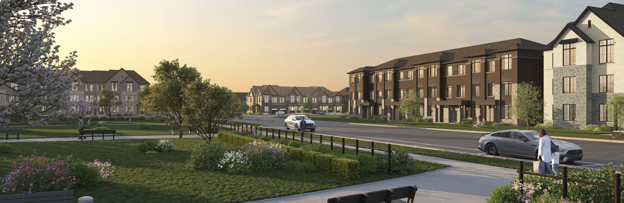 Freehold townhomes overlooking landscaped green space and walking paths